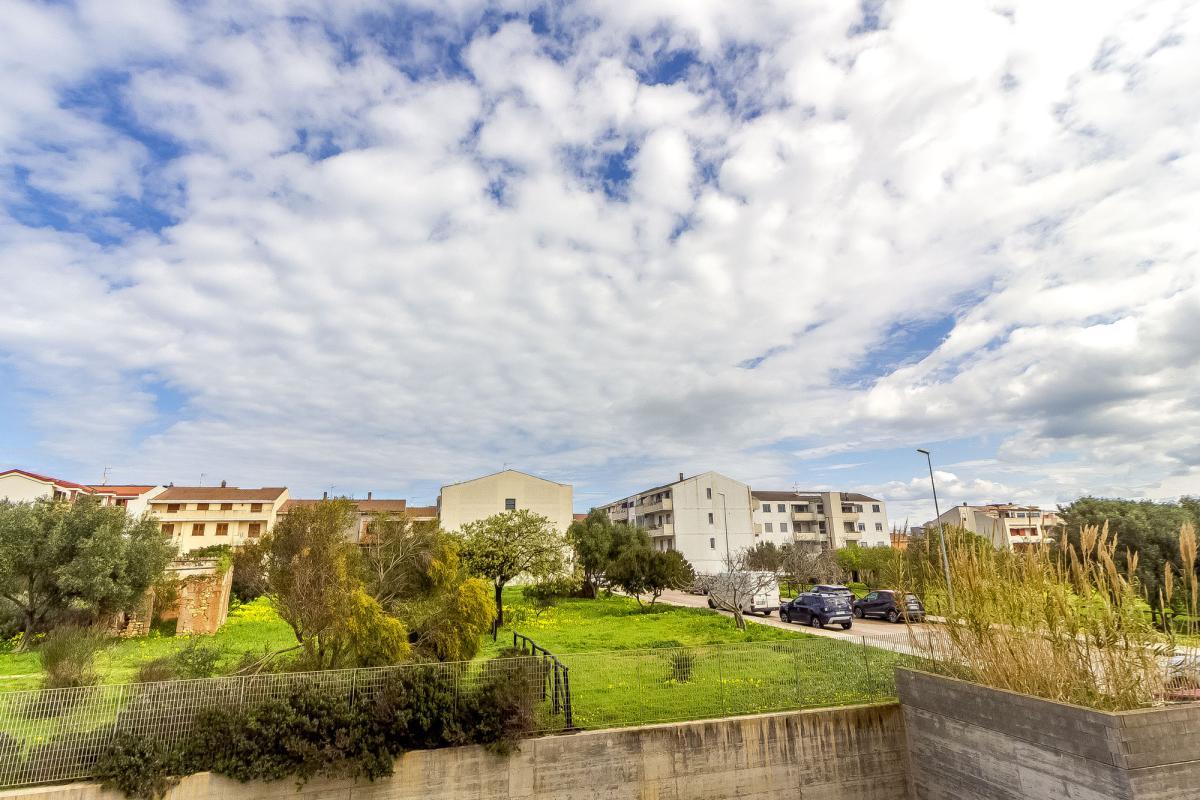 Porto Torres – Via Pertini - Trilocale con balcone vista parco, posto auto e cantina