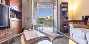 Sassari – Quartiere Cappuccini | Luminoso 5° piano con veranda, vista sul verde, posto auto e cantina